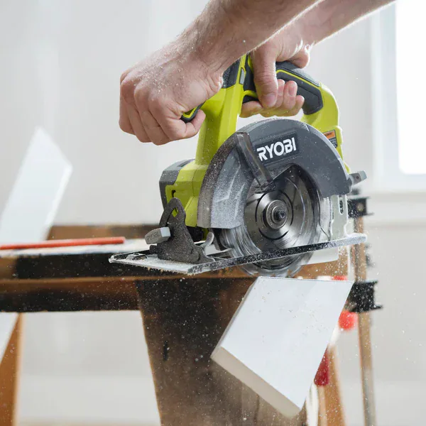 Circular saw cutting lumber